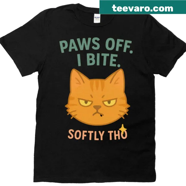 Cute T-shirt featuring a grumpy orange cat and humorous text