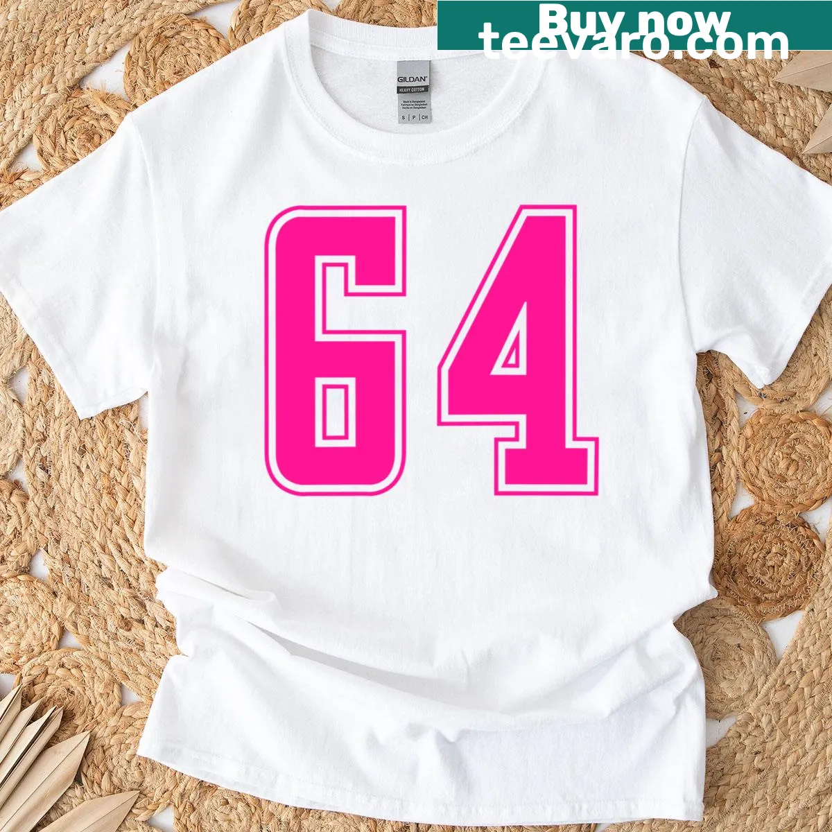 Vintage distressed Pink T-shirt featuring the number 64 for sports fans — on a men's t-shirt
