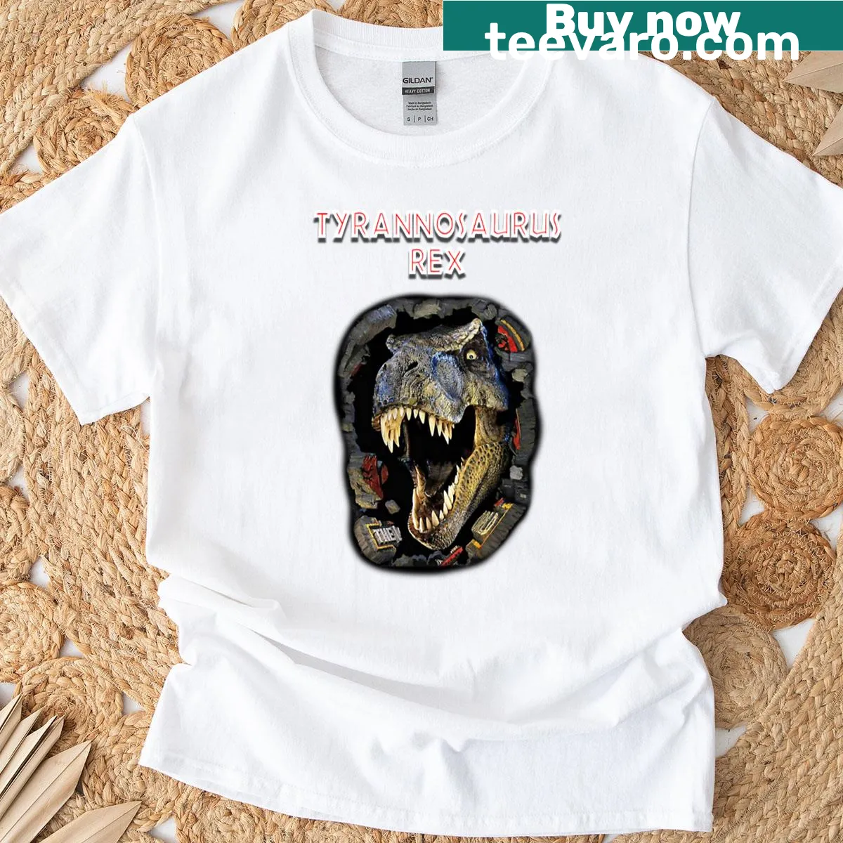 Dinosaur graphic T-shirt featuring a T-Rex head — on a men's t-shirt