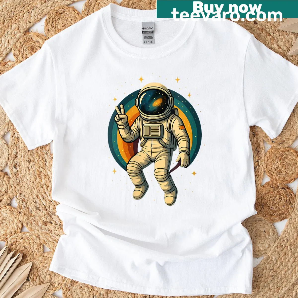 Illustration of an astronaut helmet with a peace sign against a cosmic background. — on a men's t-shirt