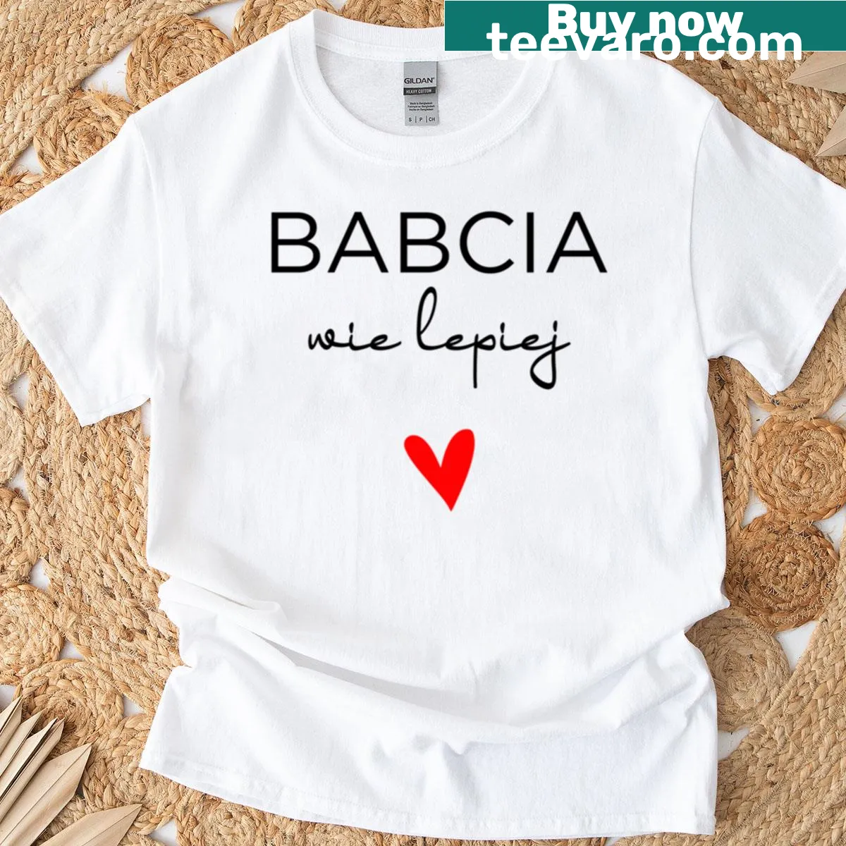 Text 'Babcia Wie Lepiej' with red heart on T-shirt. — on a men's t-shirt