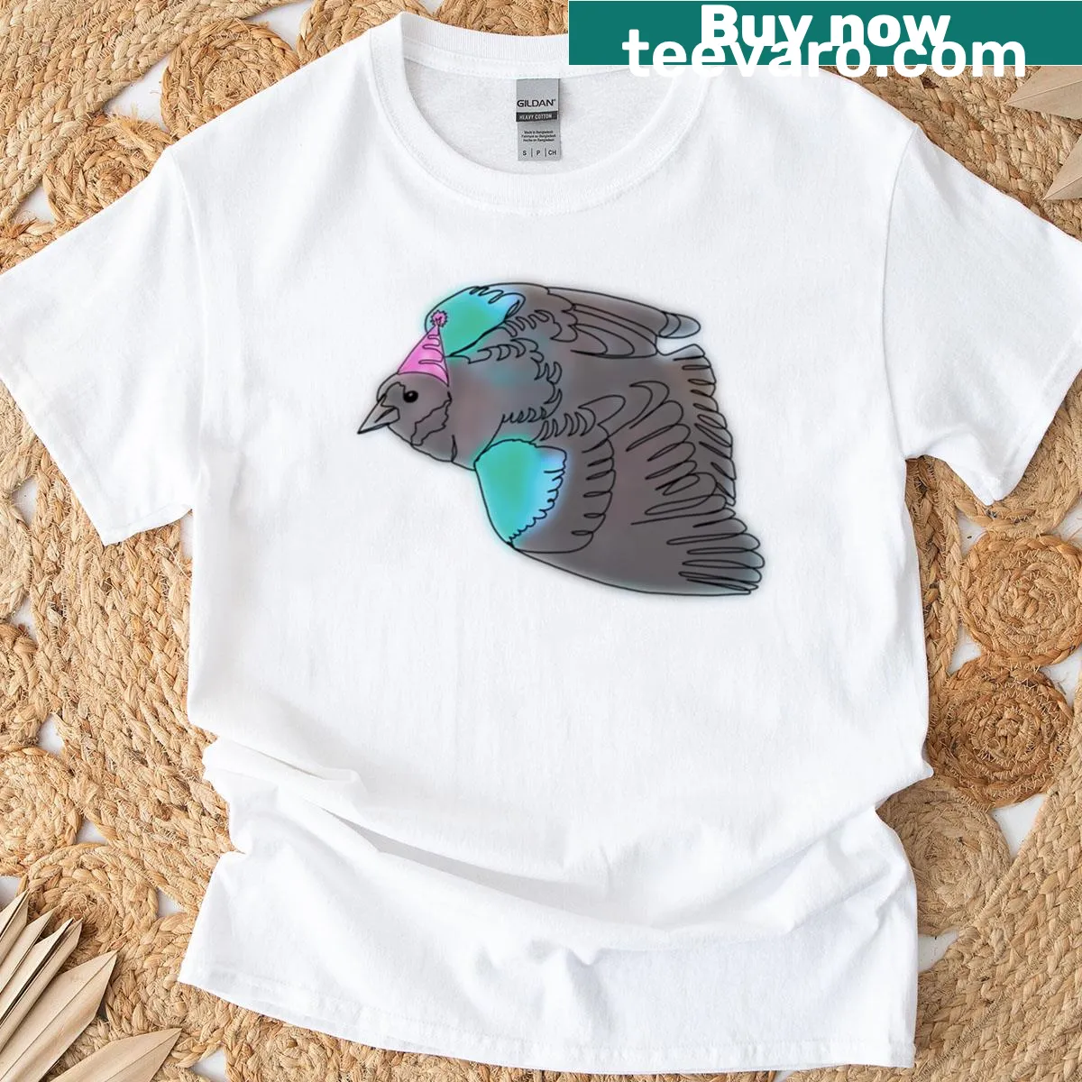 Illustrated blackbird in a pink party hat on an oversized t-shirt — on a men's t-shirt