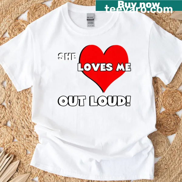 Cute typography 'She Loves Me Out Loud' with heart designs on a couple's t-shirt.