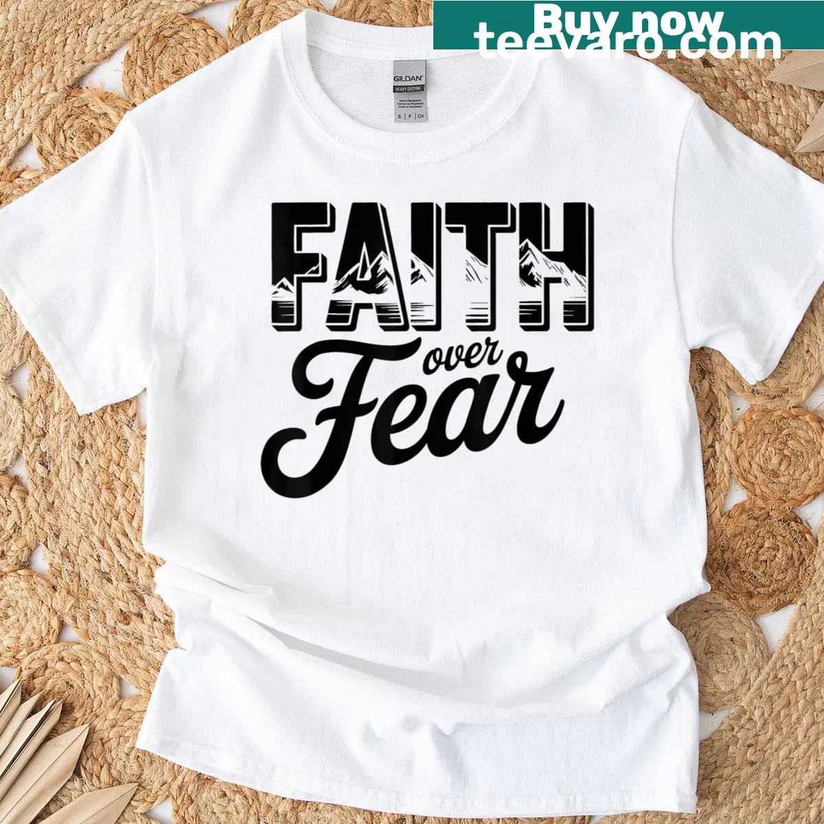 Inspirational graphic tee stating Faith Over Fear in modern typography — on a men's t-shirt