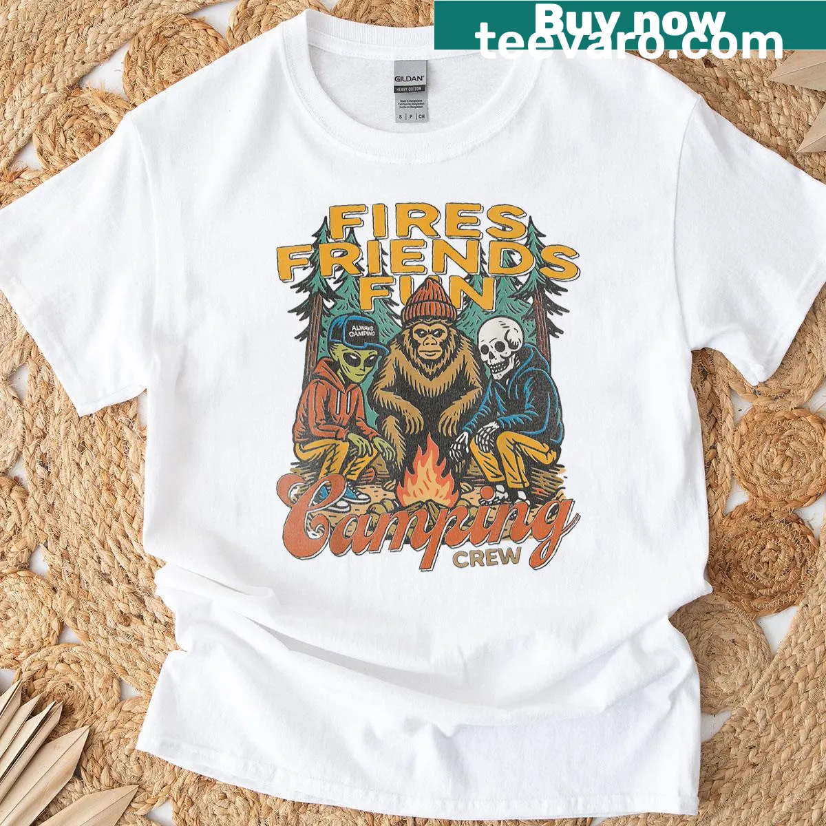 Cartoon alien, Bigfoot, and skeleton camping graphic on a fun tee — on a men's t-shirt