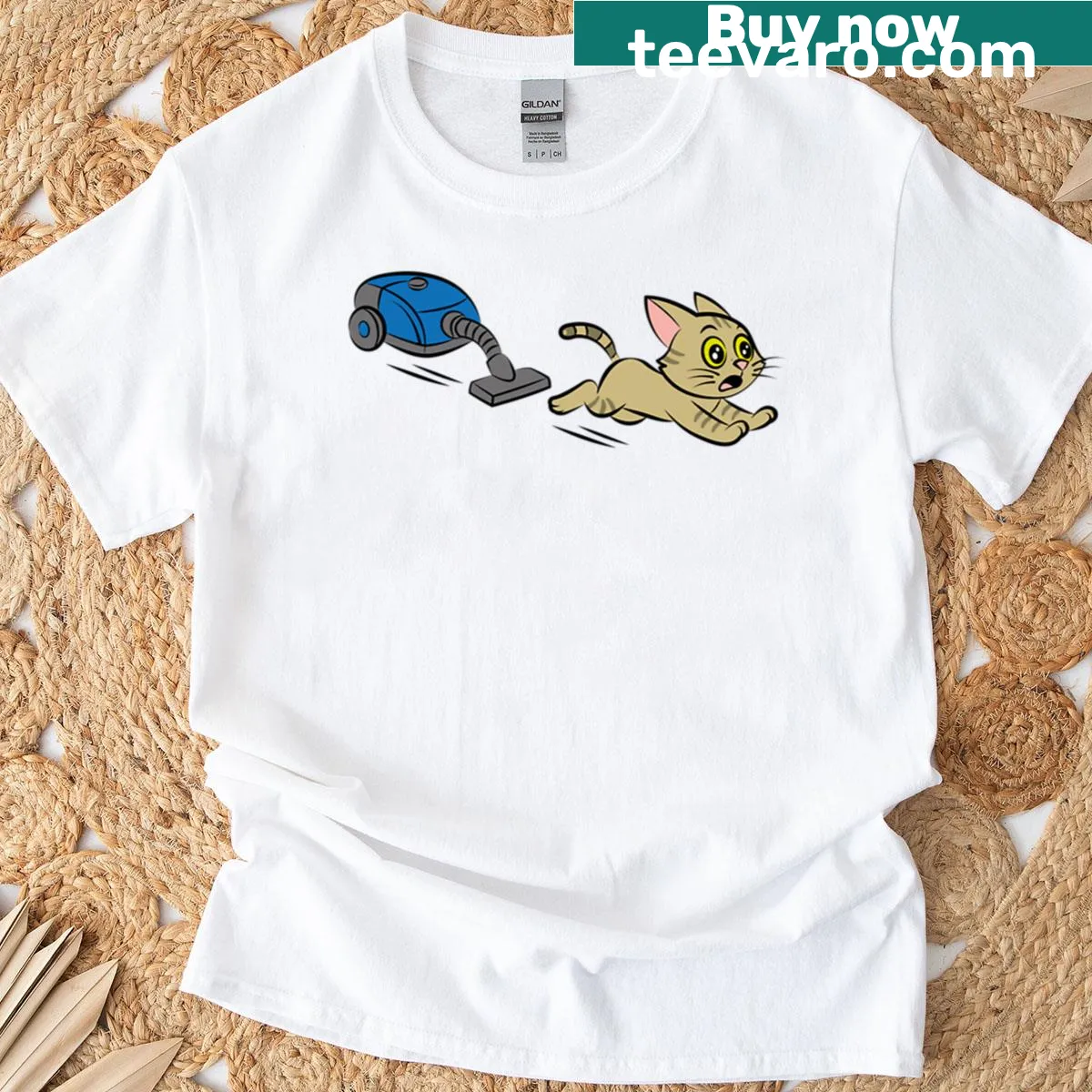 Cartoon cat running from a vacuum cleaner on a humorous T-shirt. — on a men's t-shirt