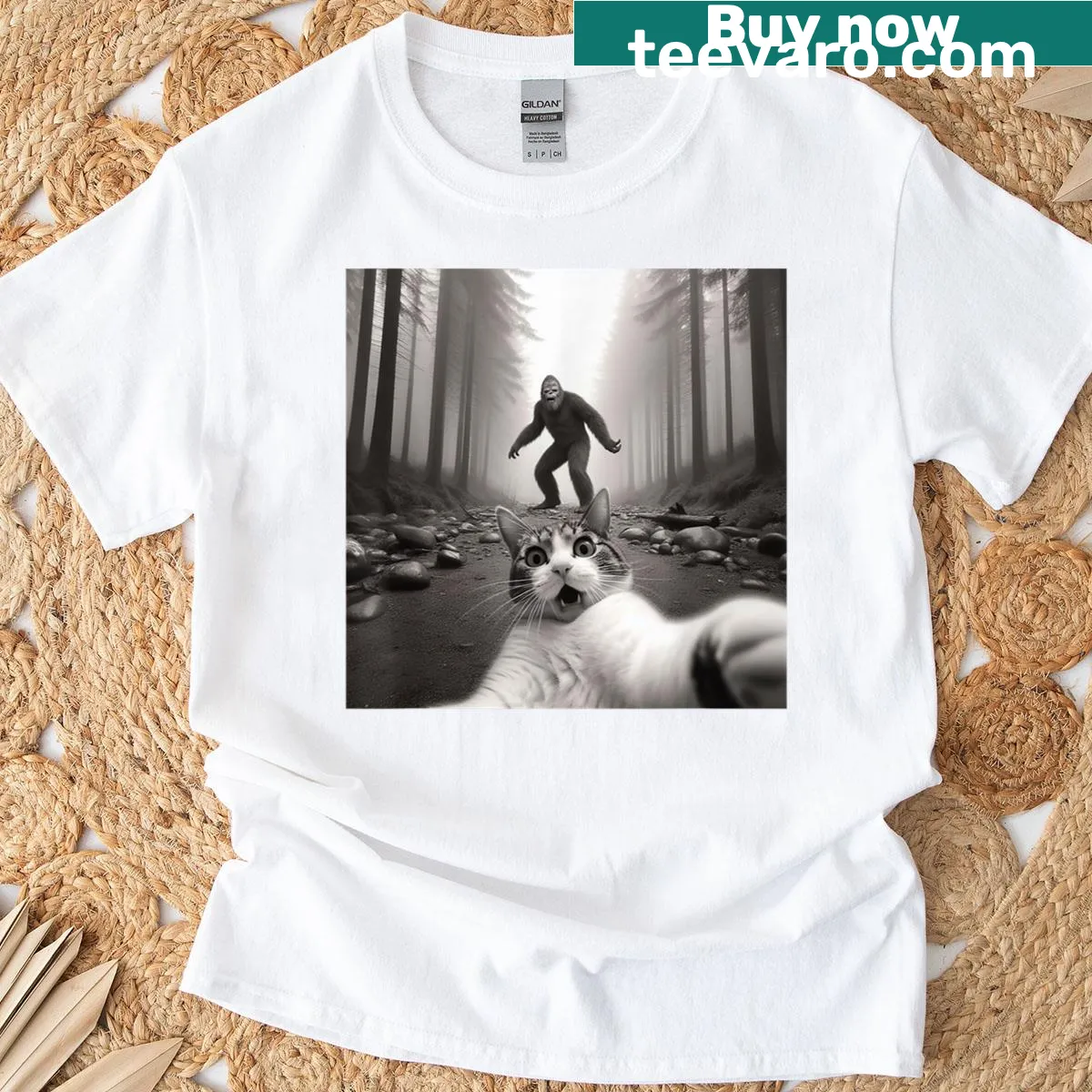 Illustration of a scared cat taking a selfie with Sasquatch on a t-shirt — on a men's t-shirt