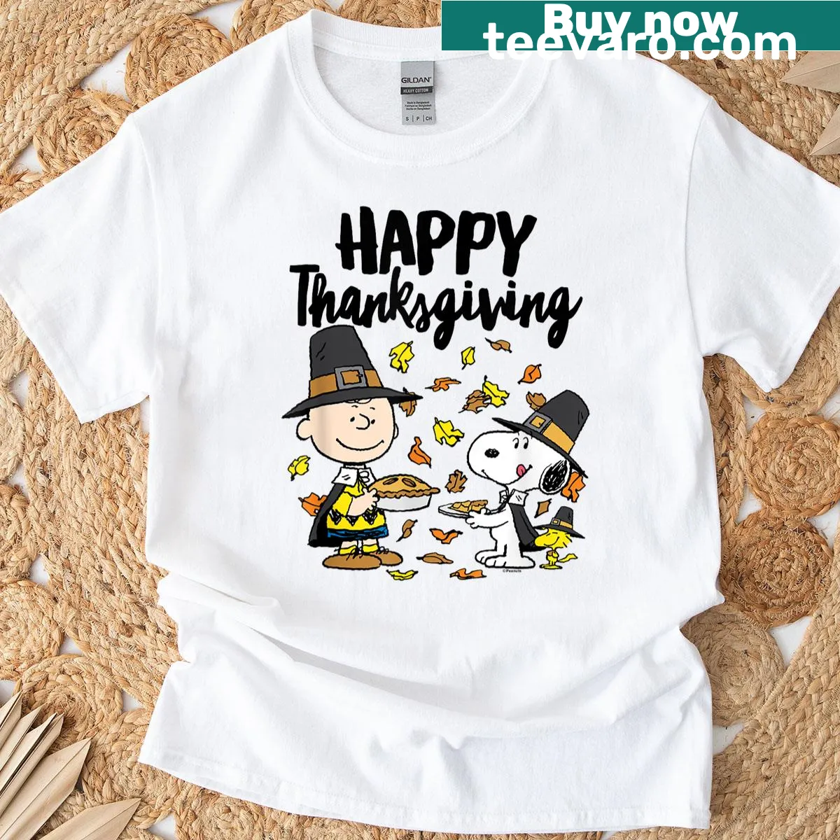 Peanuts characters celebrating Thanksgiving graphic T-shirt — on a men's t-shirt