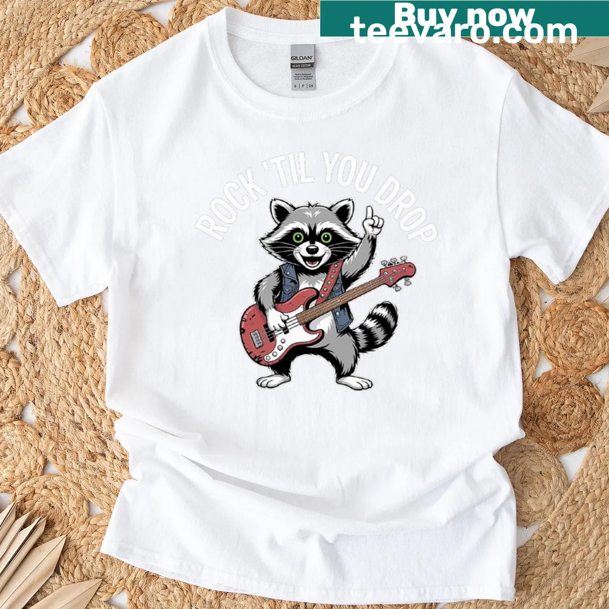 Funny raccoon playing guitar graphic T-shirt — on a men's t-shirt