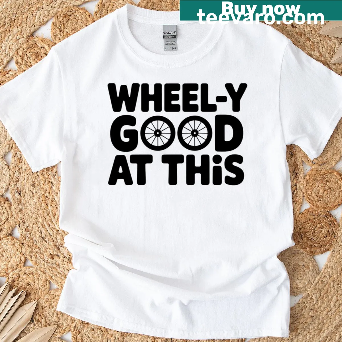 Humorous pottery-themed T-shirt with the phrase 'Wheely Good At This' — on a men's t-shirt