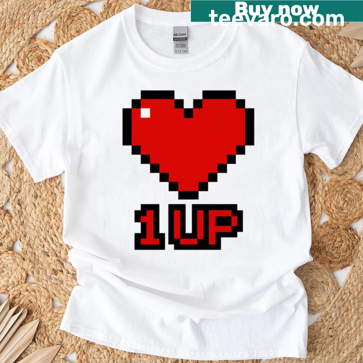 Retro pixel art tee with heart and '1up' text — on a men's t-shirt