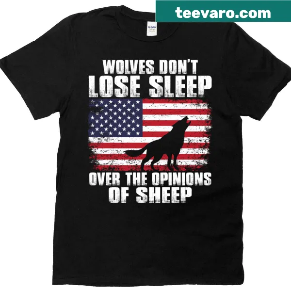 T-shirt with text 'American Wolves Don't Lose Sleep Over The Opinions Of Sheep' in bold typography.