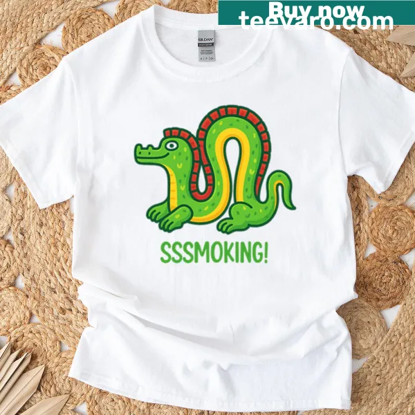 Cartoon dragon graphic on a T-shirt featuring red spines