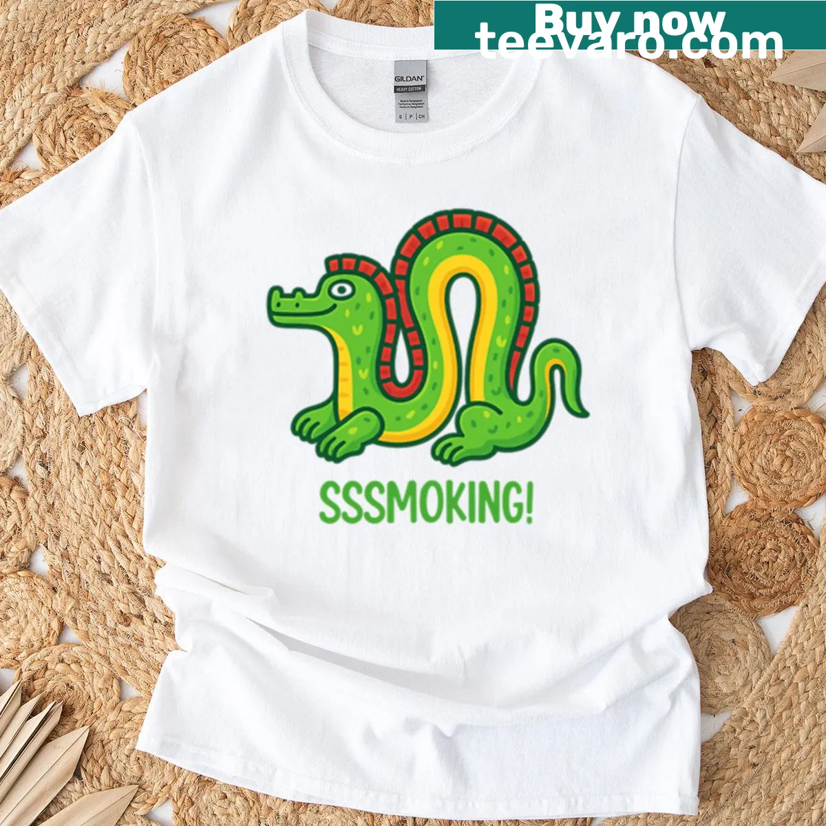 Cartoon dragon graphic on a T-shirt featuring red spines — on a men's t-shirt