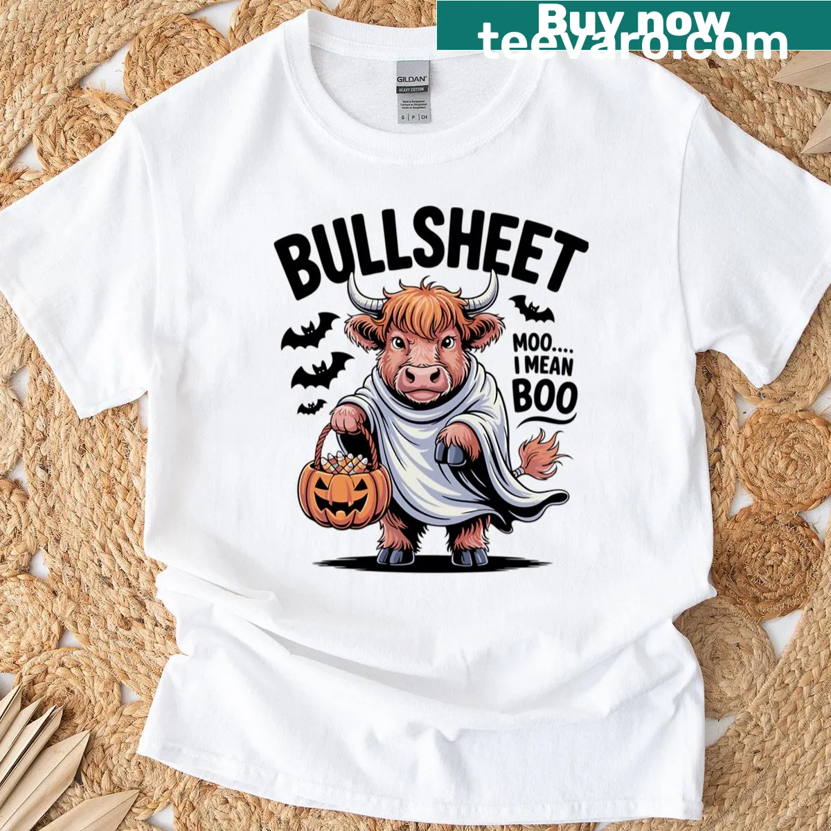 Halloween T-shirt with a playful Highland Cow dressed for trick-or-treating. — on a men's t-shirt