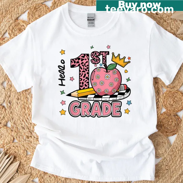 Cartoon pink leopard with 'Hello 1st Grade' text on a teacher t-shirt