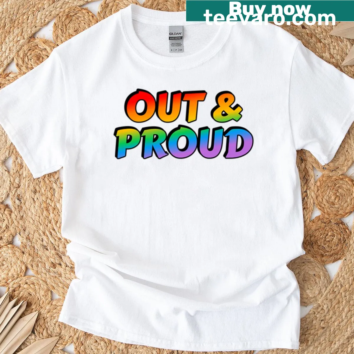 Rainbow text T-shirt with 'Out And Proud' slogan for LGBTQ pride — on a men's t-shirt