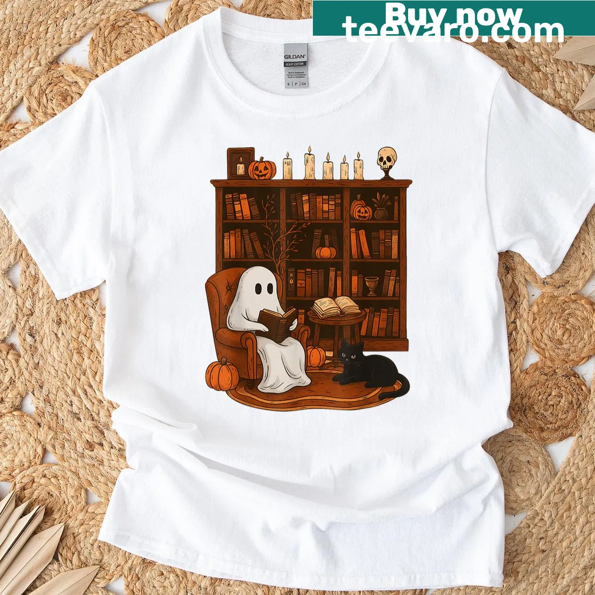 Cute ghost and cat graphic on a cozy Halloween-themed t-shirt. — on a men's t-shirt
