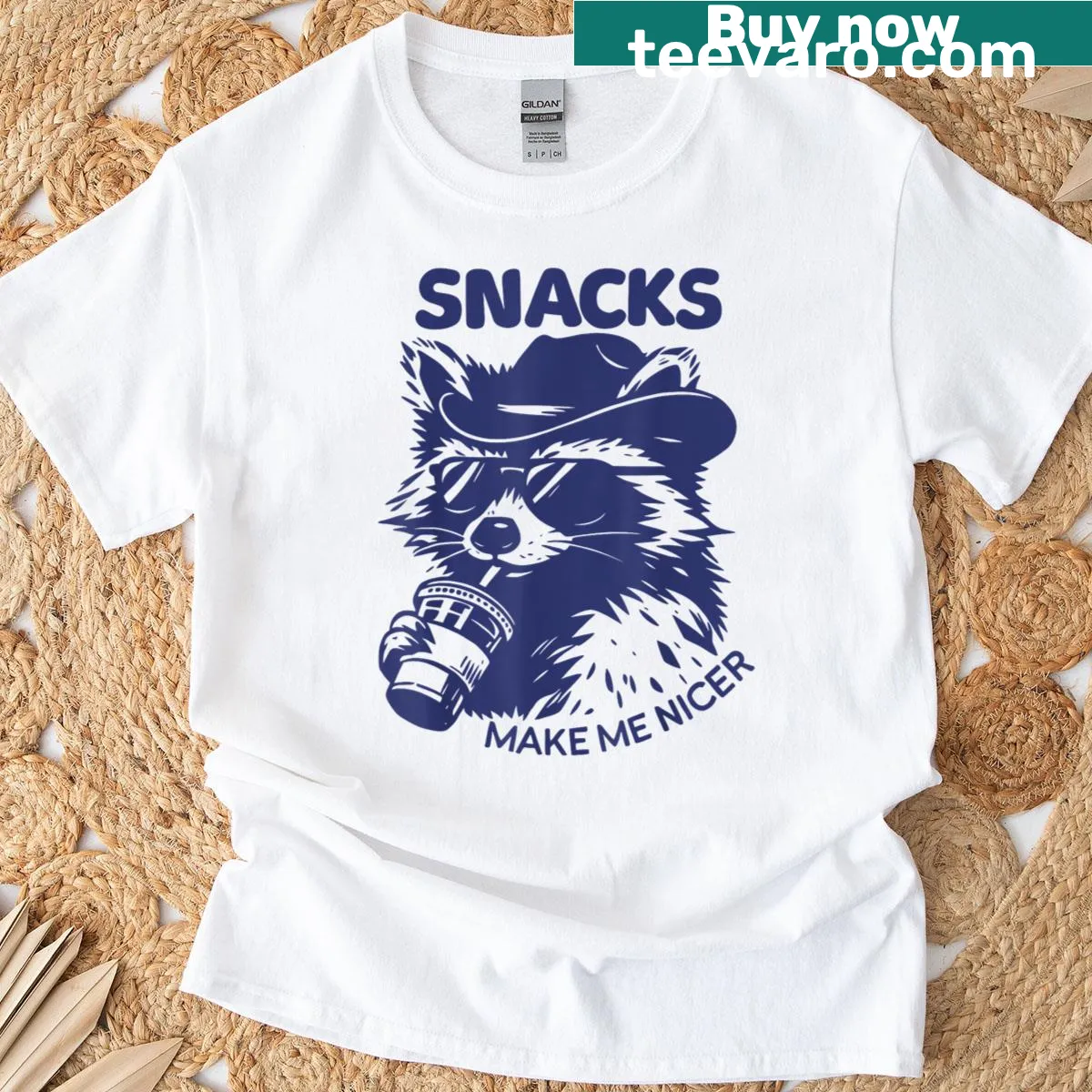 Sarcastic t-shirt with the text 'Snacks Make Me Nicer' and a raccoon illustration — on a men's t-shirt