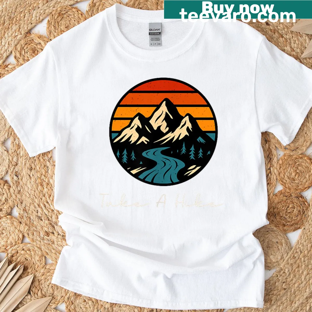 Retro hiking t-shirt featuring a hiker and nature elements — on a men's t-shirt
