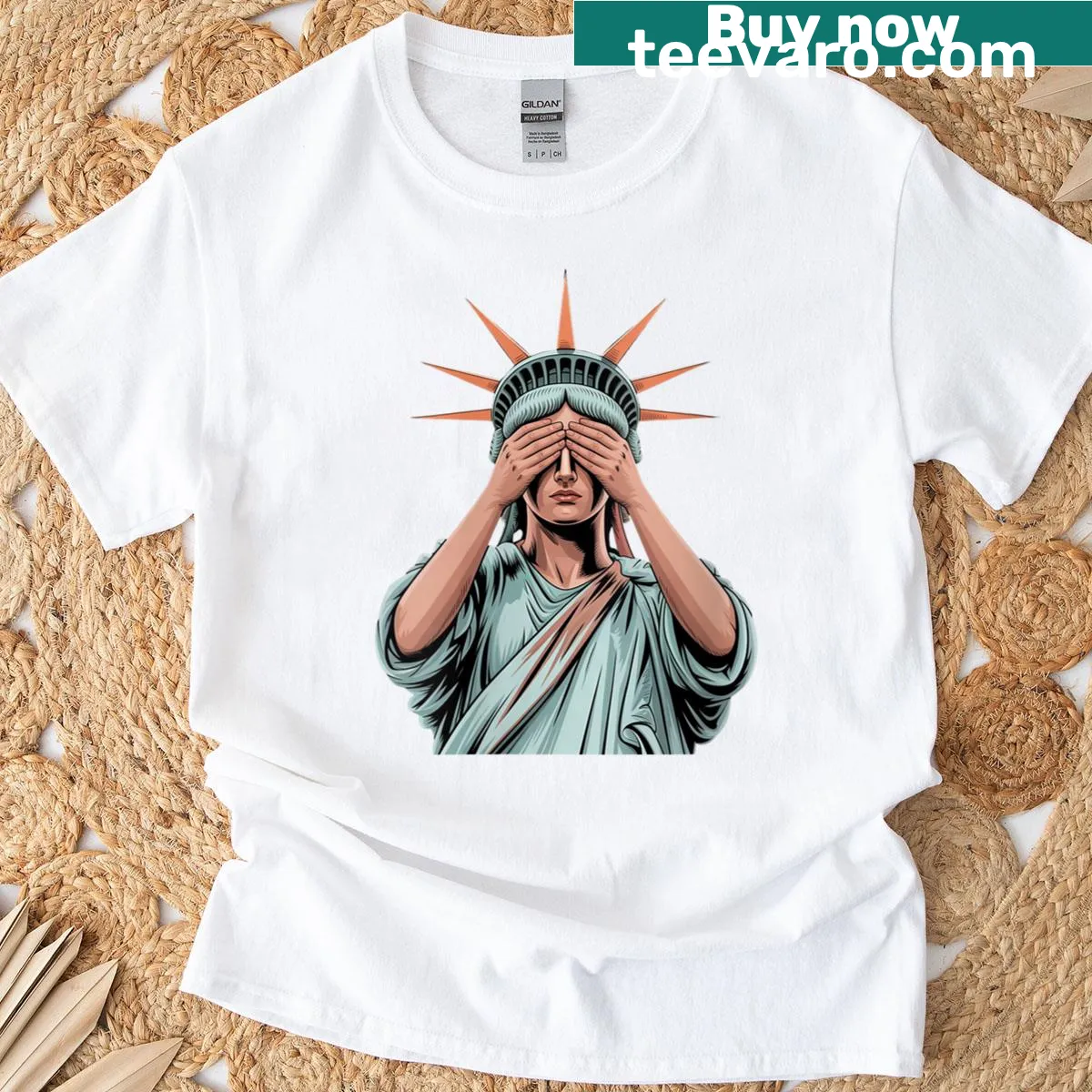 T-shirt featuring the Statue of Liberty covering her face in despair — on a men's t-shirt