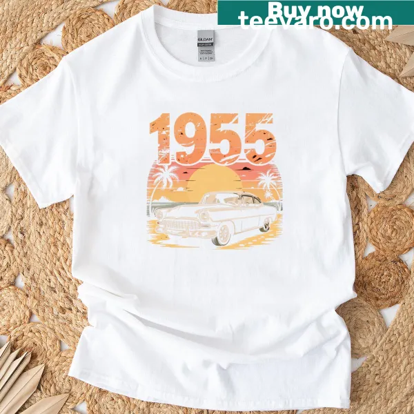 Retro t-shirt featuring an old car, sunset, and palm tree design
