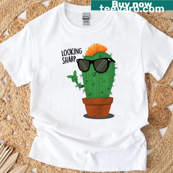 Playful cactus graphic with text 'Lookin Sharp' on T-shirt