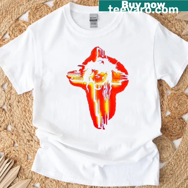 Silhouette of a fiery cross on a t-shirt.