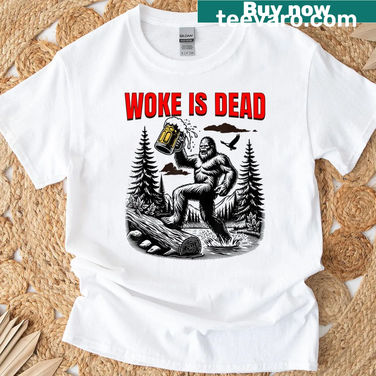 Bigfoot illustration with 'Woke Is Dead' text — on a men's t-shirt