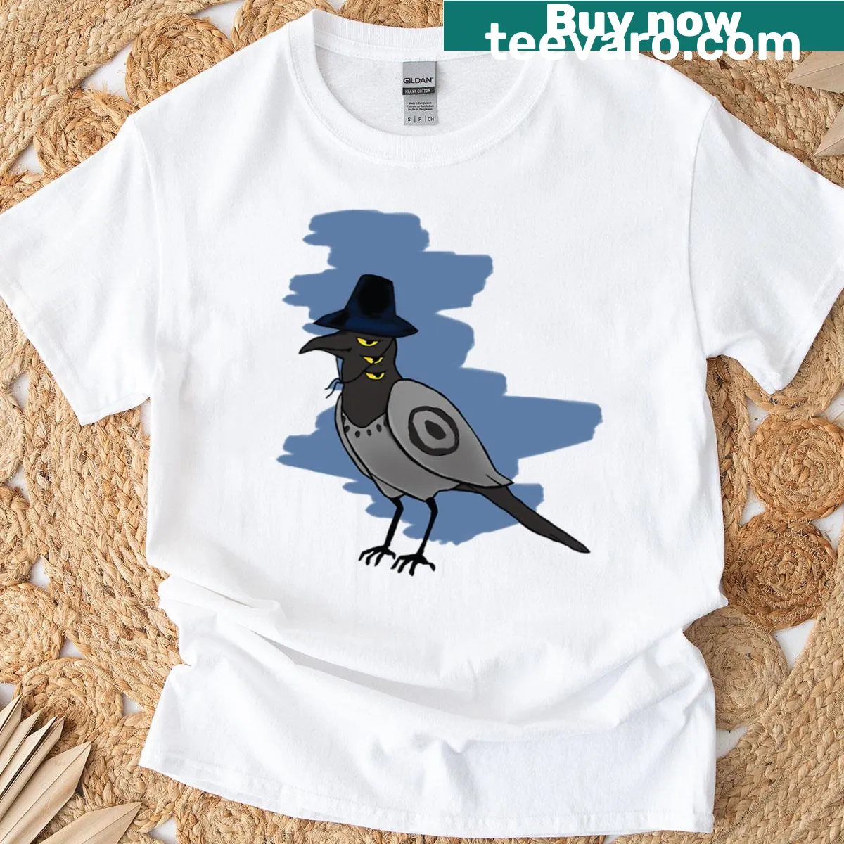 Illustrated bird design with demon hunter elements on a playful tee — on a men's t-shirt