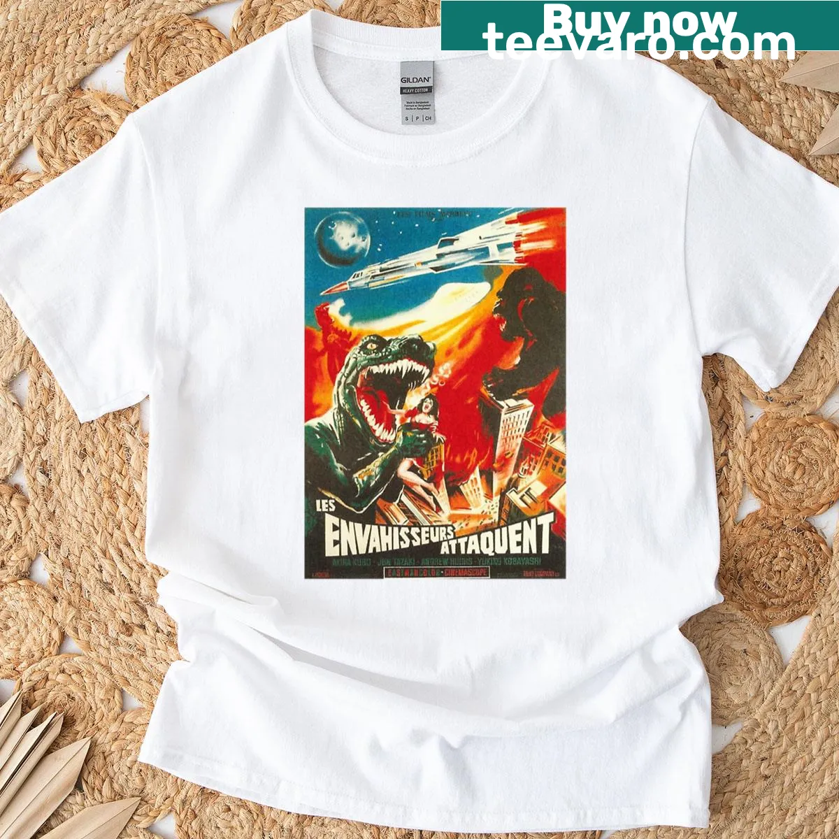 Vintage-style t-shirt featuring Godzilla and King Kong movie poster — on a men's t-shirt
