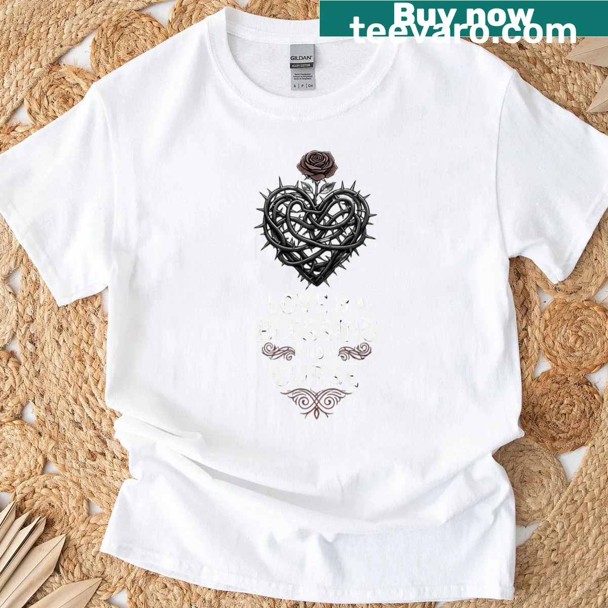 Illustrated t-shirt showing a rose with thorns representing love's dual nature — on a men's t-shirt