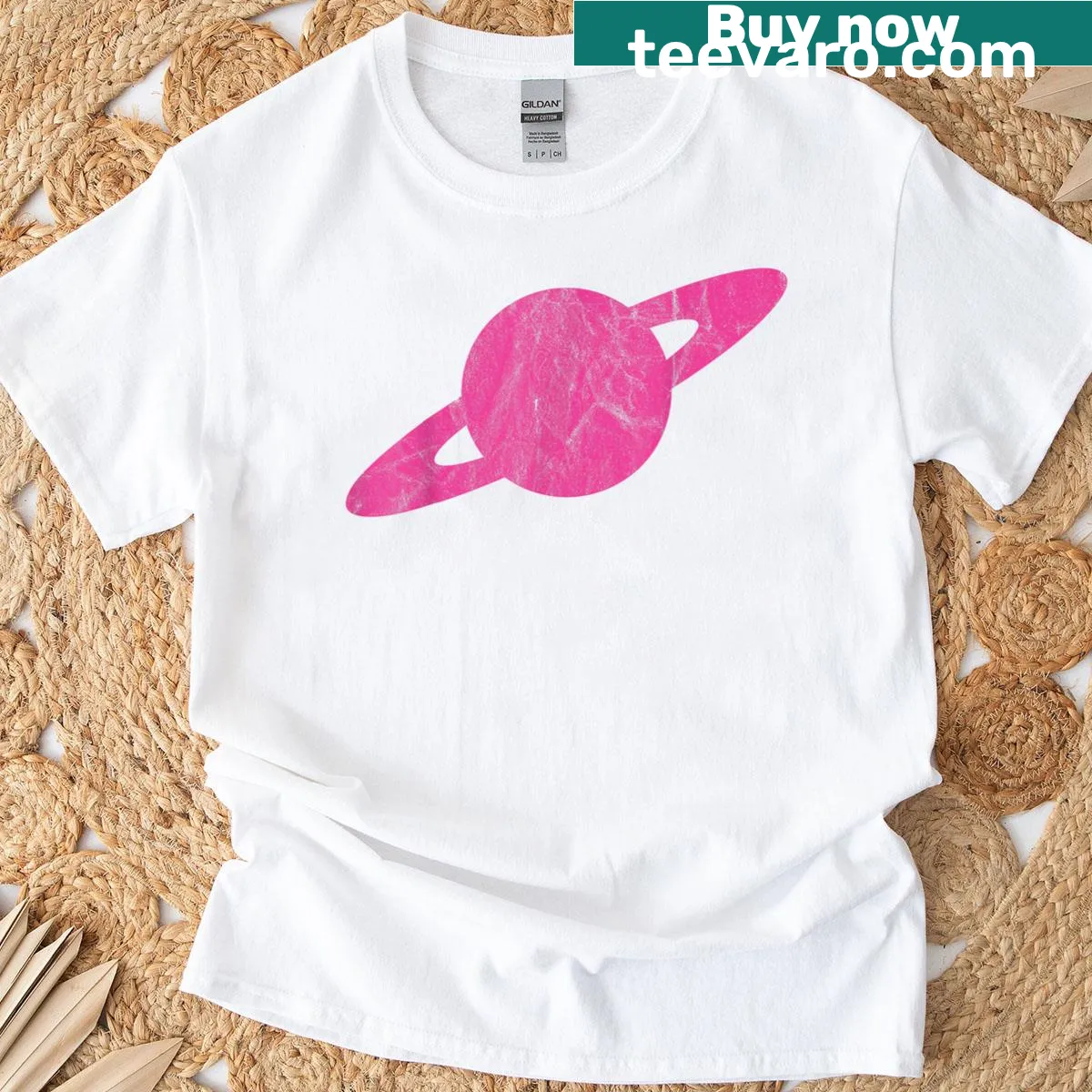 Minimalist t-shirt featuring Saturn in a typography design — on a men's t-shirt