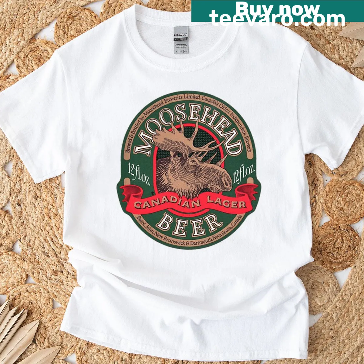 Vintage t-shirt featuring the Moosehead Lager label graphic — on a men's t-shirt