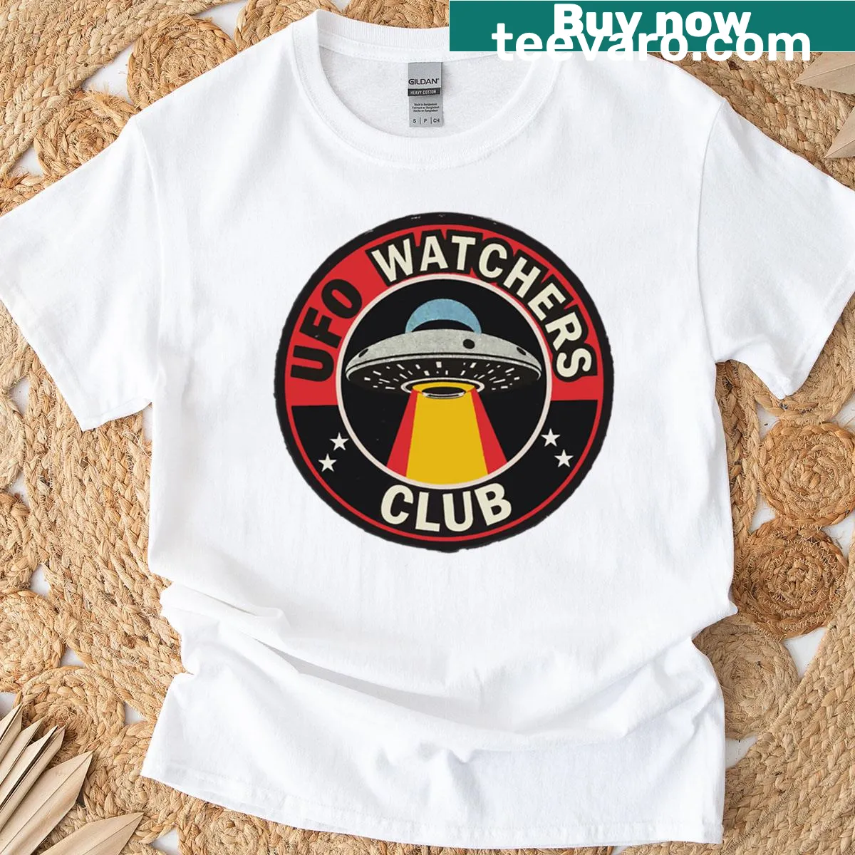 Retro UFO Watchers Club t-shirt with spaceship graphic and text — on a men's t-shirt