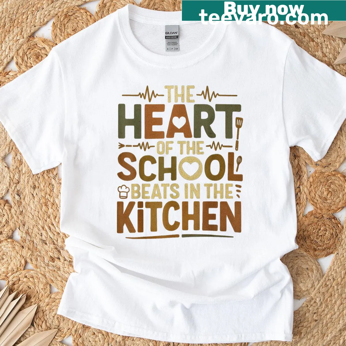 T-shirt with 'The Heart Of The School Beats In The Kitchen' text — on a men's t-shirt