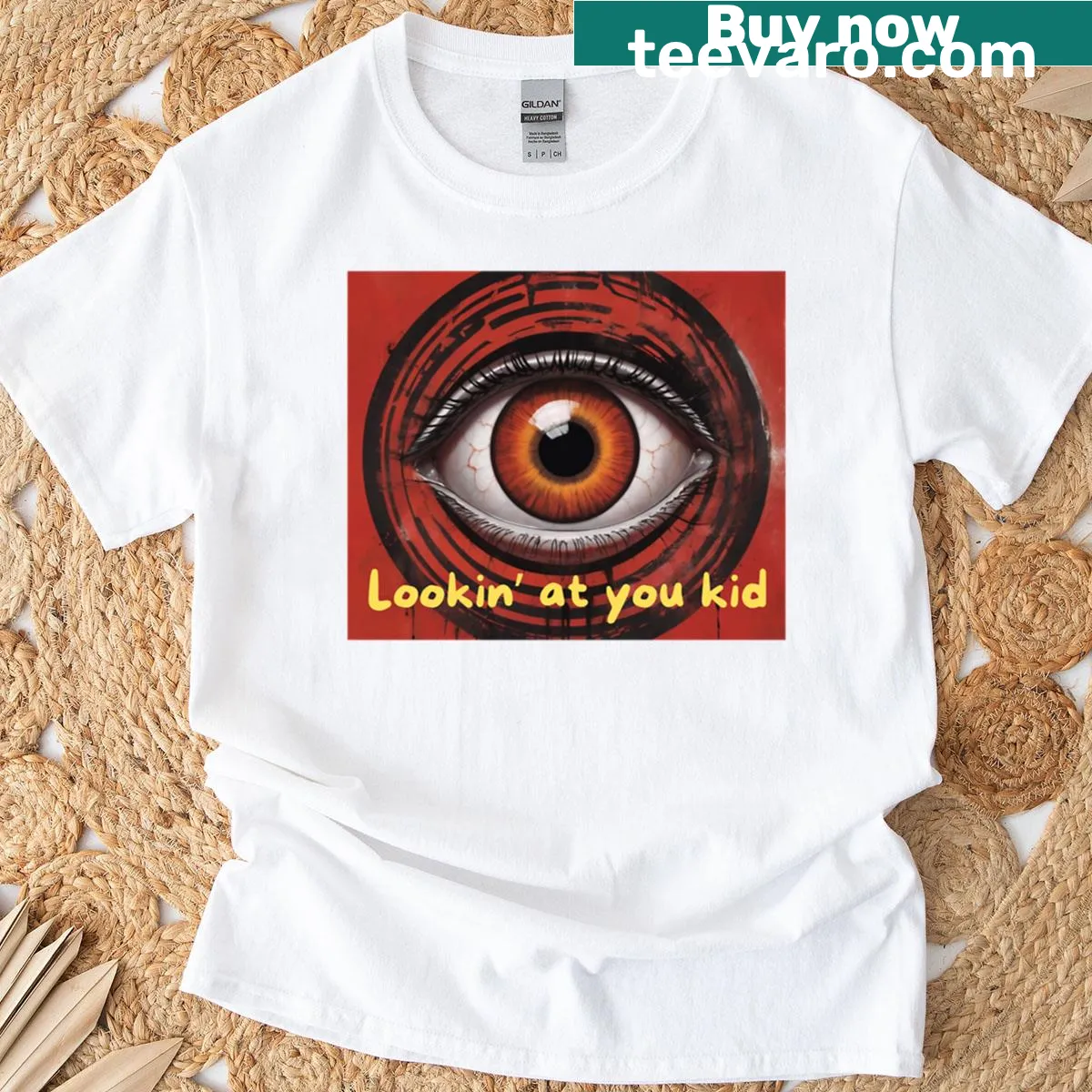 Grunge-style t-shirt featuring an eye graphic design — on a men's t-shirt