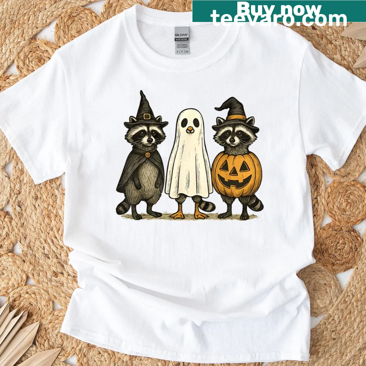 Cartoon ghost raccoon and pumpkin Halloween t-shirt — on a men's t-shirt