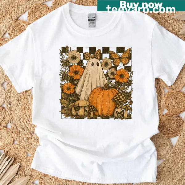 Vintage Halloween t-shirt featuring a ghost and pumpkin floral design.