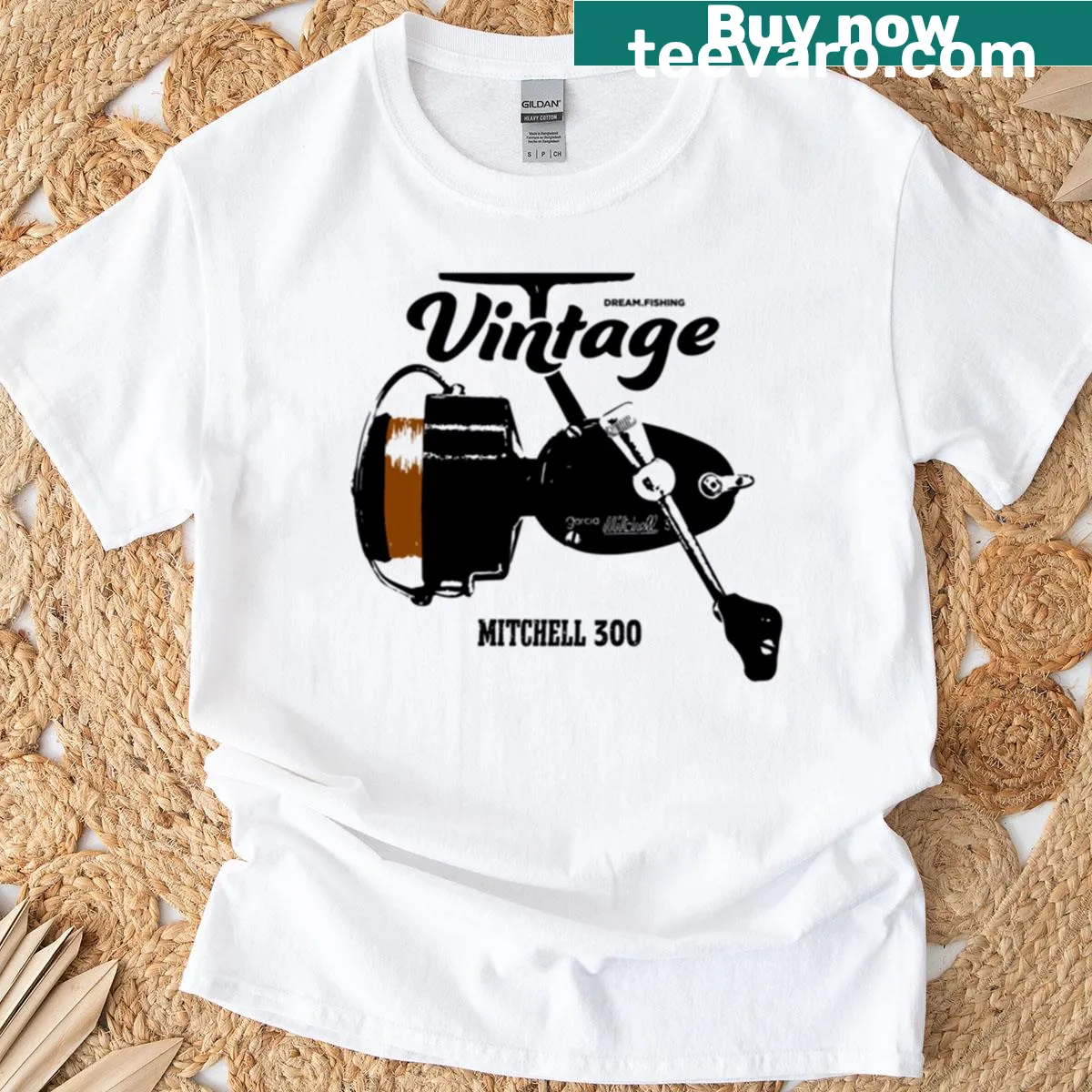 Vintage Mitchell 300 fishing reel design on an oversized T-shirt — on a men's t-shirt