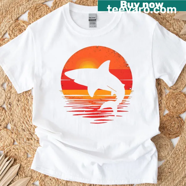 Vintage shark silhouette t-shirt with a sunset backdrop.