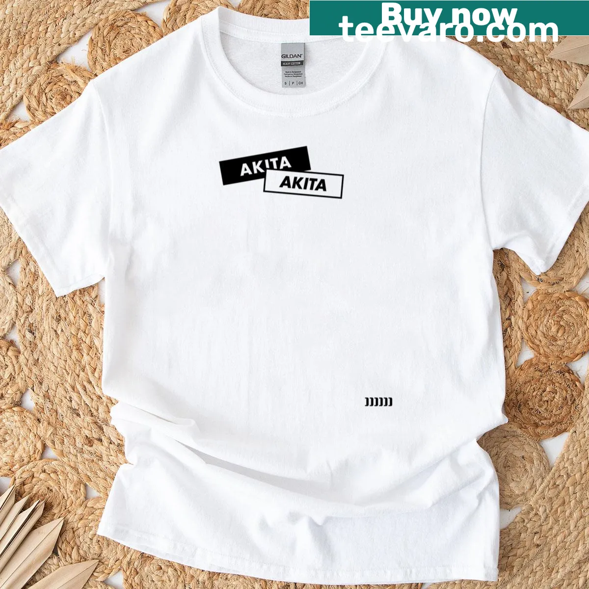 Minimalist Akita boxlogo t-shirt in black — on a men's t-shirt