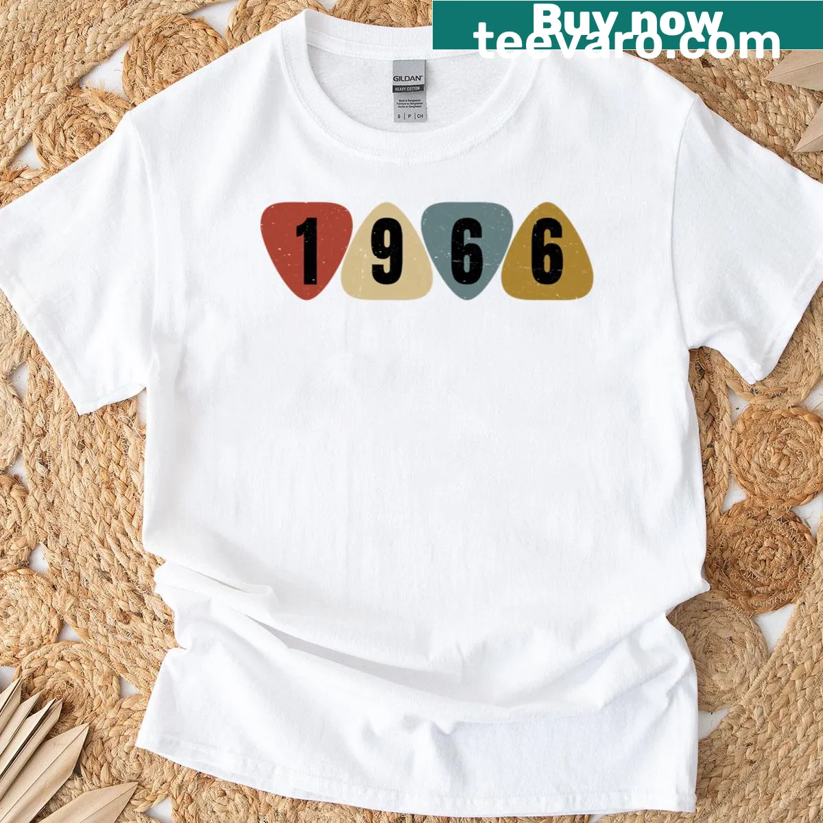 Guitar pick design T-shirt celebrating musicians born in 1966 — on a men's t-shirt
