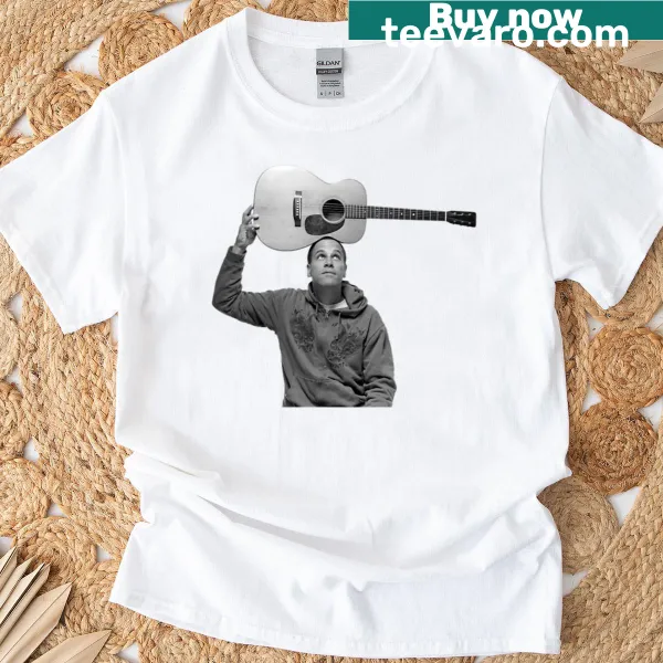 T-shirt featuring Jack Johnson illustrated with his guitar, perfect for fans.