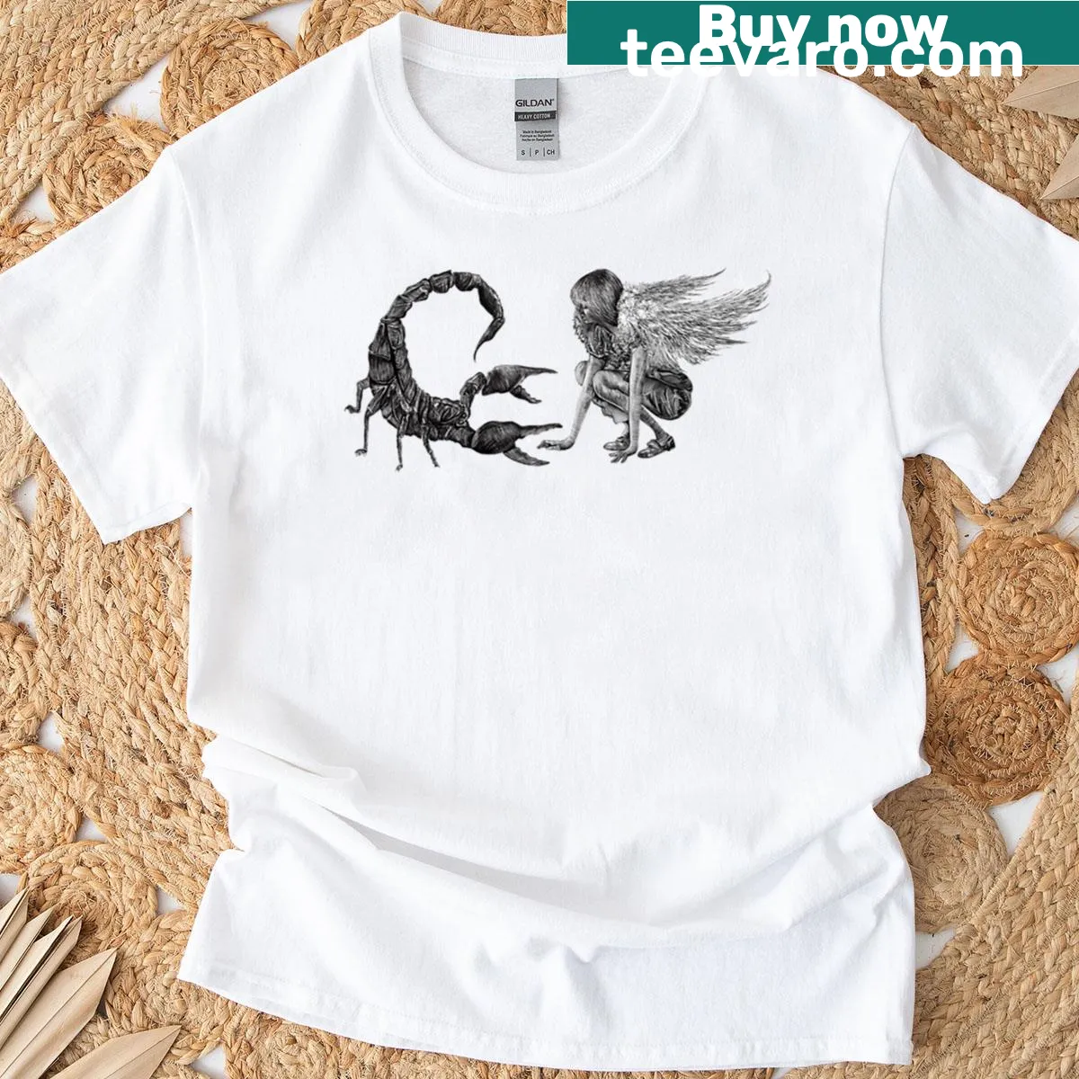 Oversized T-shirt featuring a light angel and a black scorpion graphic — on a men's t-shirt