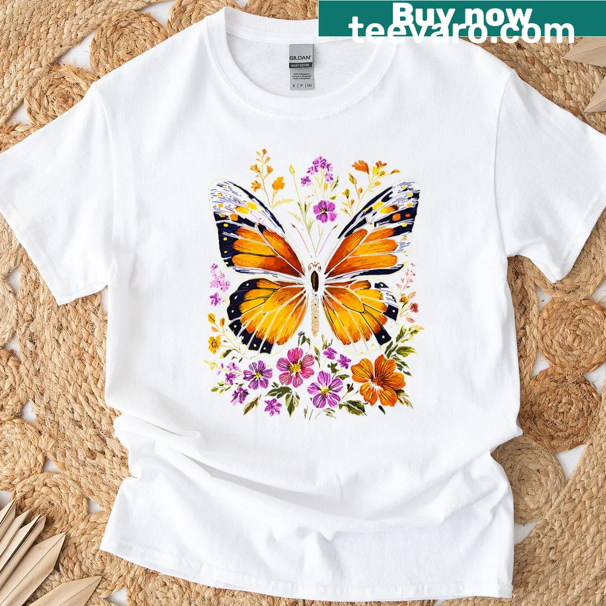 Floral design with a monarch butterfly on a nature-themed T-shirt — on a men's t-shirt