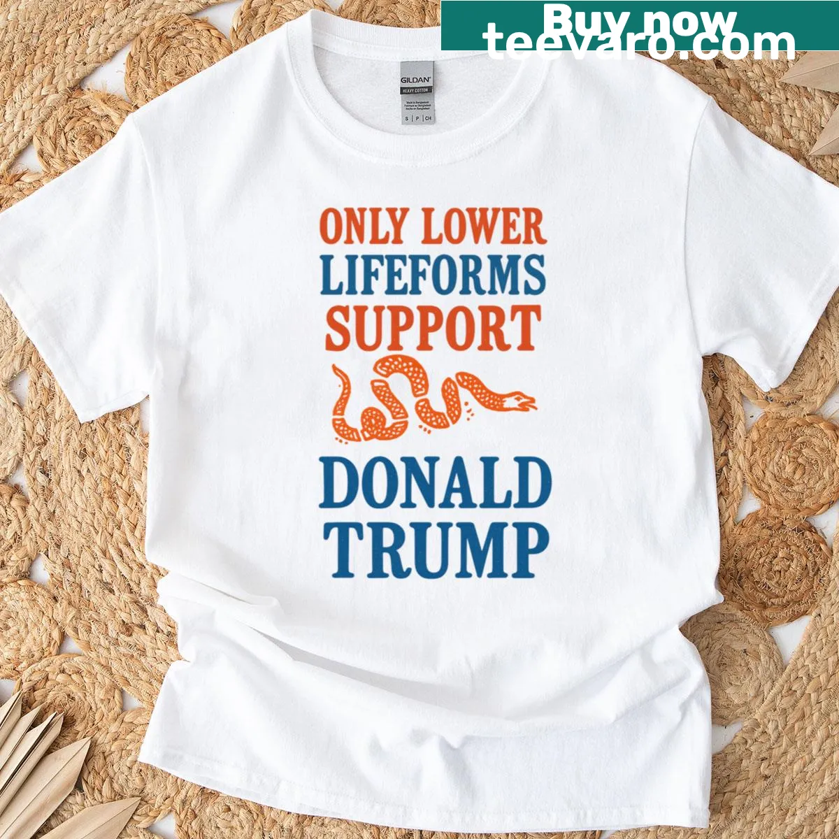 Bold text reading 'Only Lower Lifeforms Support Donald Trump' on a T-shirt. — on a men's t-shirt