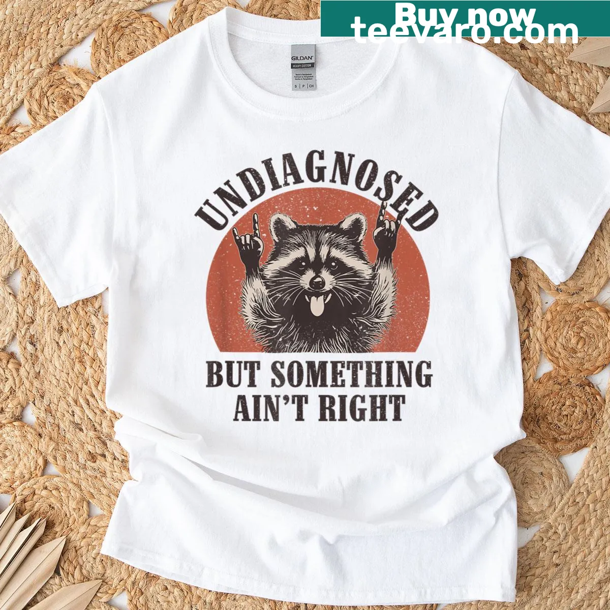 Retro raccoon graphic creating an unhinged and feral vibe — on a men's t-shirt