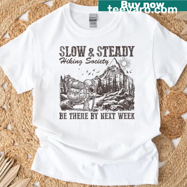 Funny turtle graphic on a hiking-themed T-shirt.