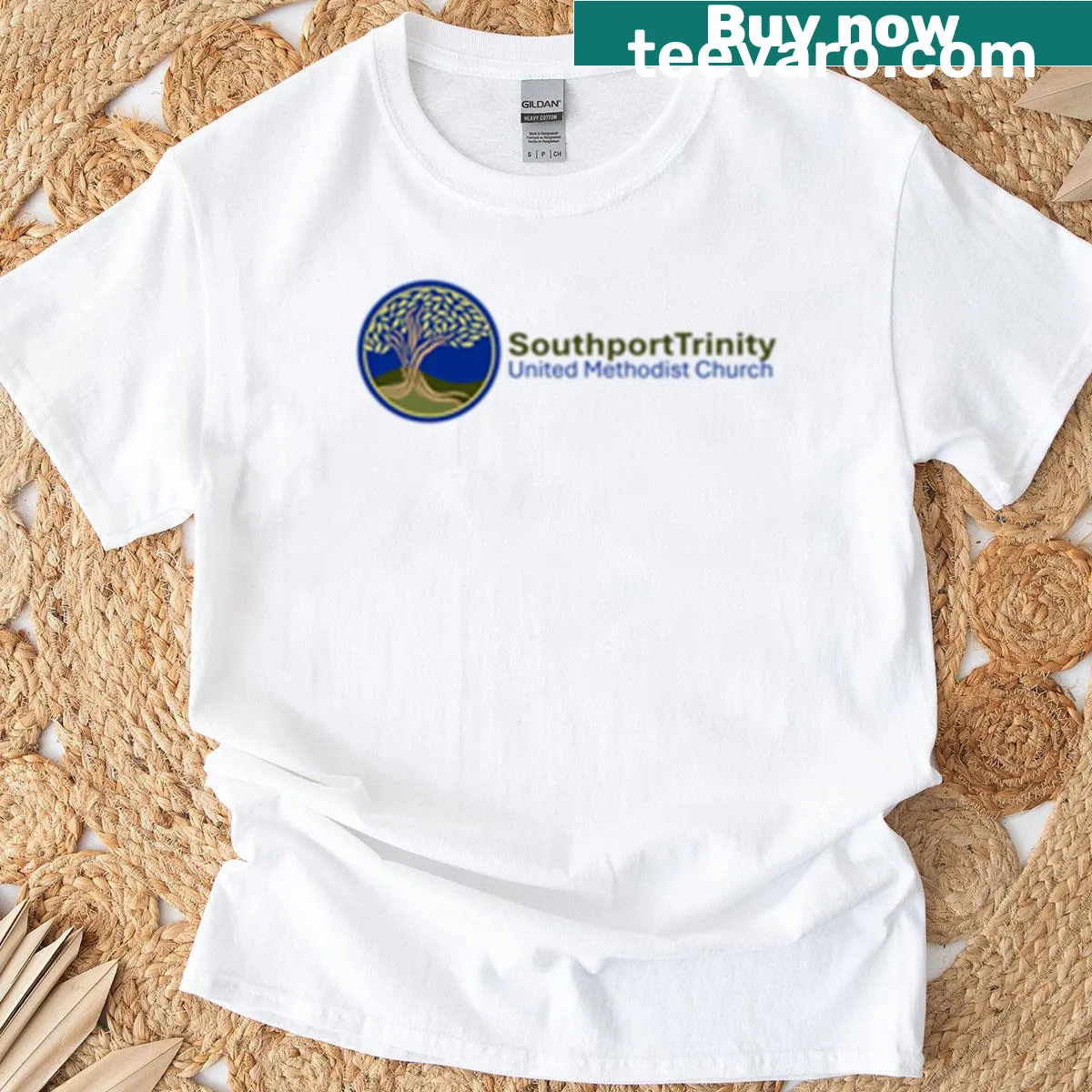 Minimalist T-shirt with small tree logo and side name print — on a men's t-shirt